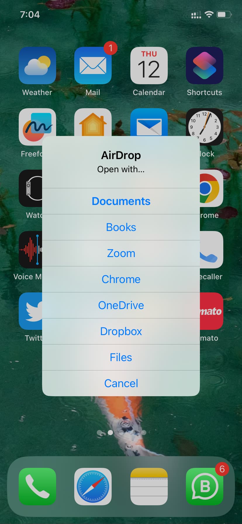 Alerte contextuelle AirDrop pour choisir l'application pour ouvrir le fichier