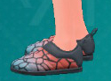 Une capture d’écran des chaussures Slip-On à motifs de Pokémon Écarlate et Violet: The Teal Mask.