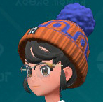 Une capture d’écran d’un bonnet Pom Pom Pom Beanie à motifs de Pokémon Écarlate et Violet: The Saral.