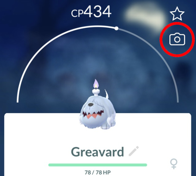 Une capture d’écran de Pokémon GO de la page d’information d’un Greavard. L’icône de l’appareil photo en haut à droite, qui permet aux joueurs d’accéder à la fonction d’instantané, est entourée en rouge.