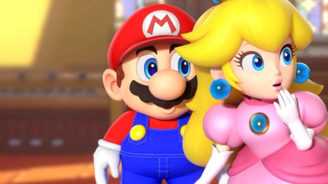 Une capture d’écran de Super Mario RPG de Mario et Peach regardant hors de l’écran.